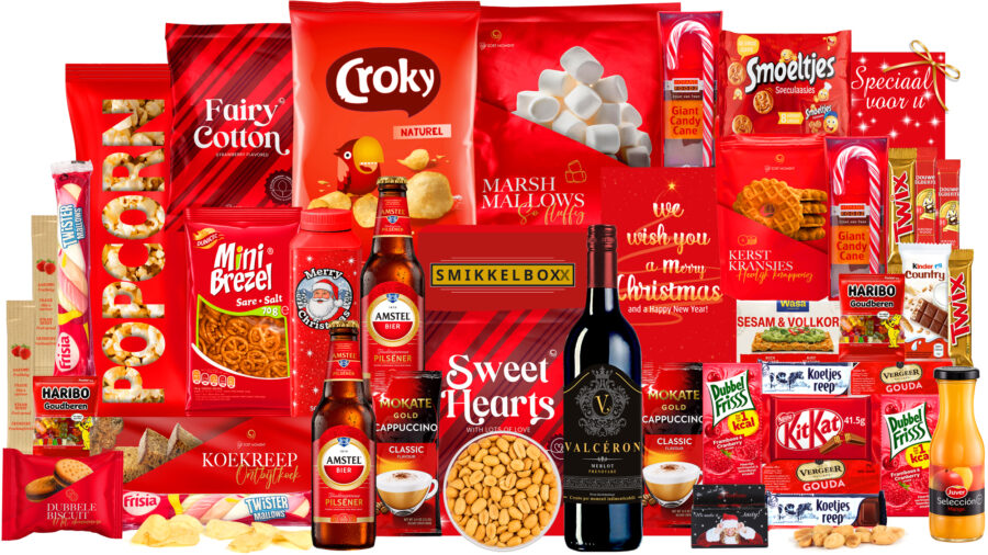 Kerstpakket met rode wijn en bier, chocolade, in een luxe feestelijke geschenkdoos.