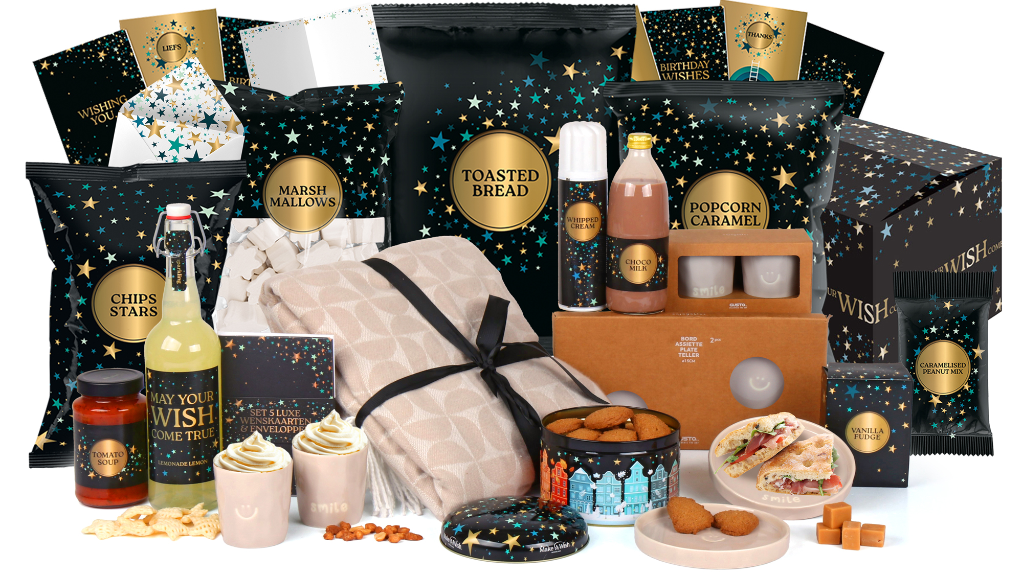Kerstpakket Make a Wish met luxe snacks, chocolademelk, koekjes, chips, plaid en feestelijke verpakking.