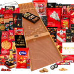 Compleet kerstgeschenk met lekkernijen, bier en sjoelbak